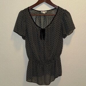Elegant Black and Cream Patterned Blouse
